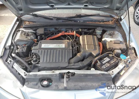 2004 Honda Civic Hybrid from USA, damaged, VIN JHMES96694S017503